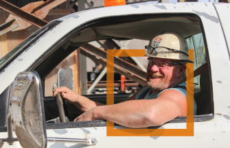 Man smiling in truck